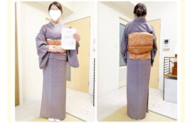 江戸小紋に袋帯を結び、修了証を手にした生徒さんの姿
